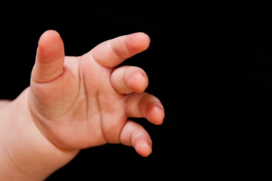 Main de bébé - © Dreamstime Main de bébé